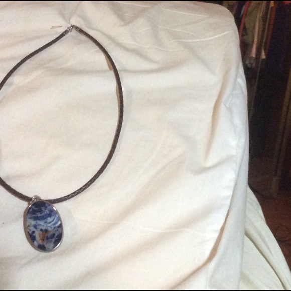Sodalite piece strung on braided leather cord. - Picture 3 of 3